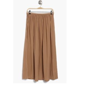 t a h a r i • pleated midi skirt